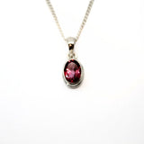 Topas rosa, fasetterad oval litet silverhänge