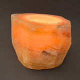 Calcite orange, tea light holder rough stone with polished top