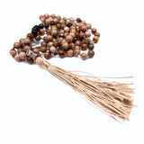 Mala intentionshalsband, grundning