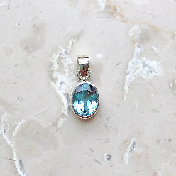 Blue topaz pendant oval mini smooth setting