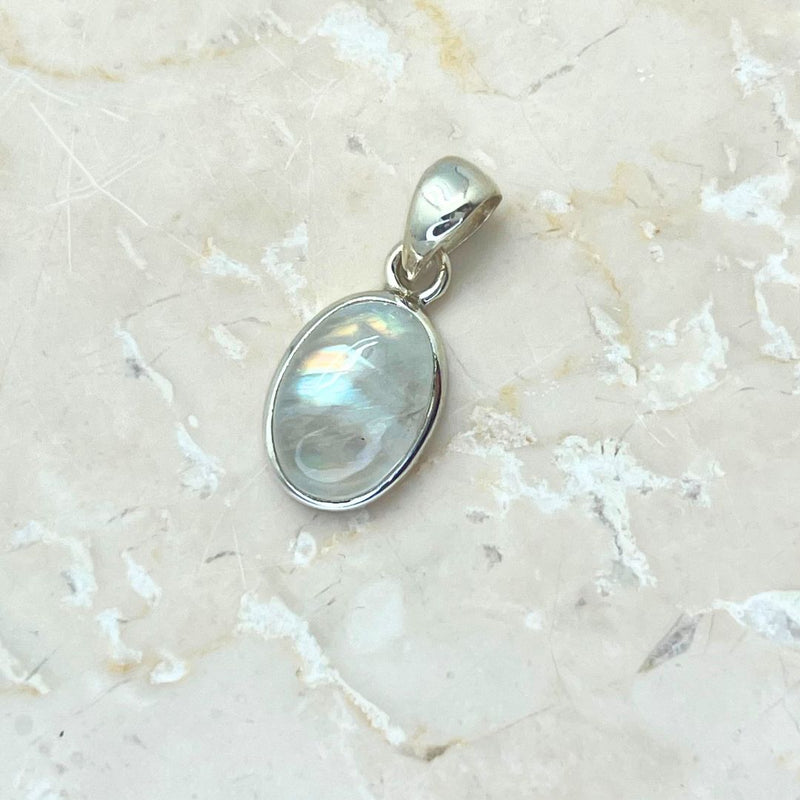 Rainbow moonstone, small oval pendant in plain silver