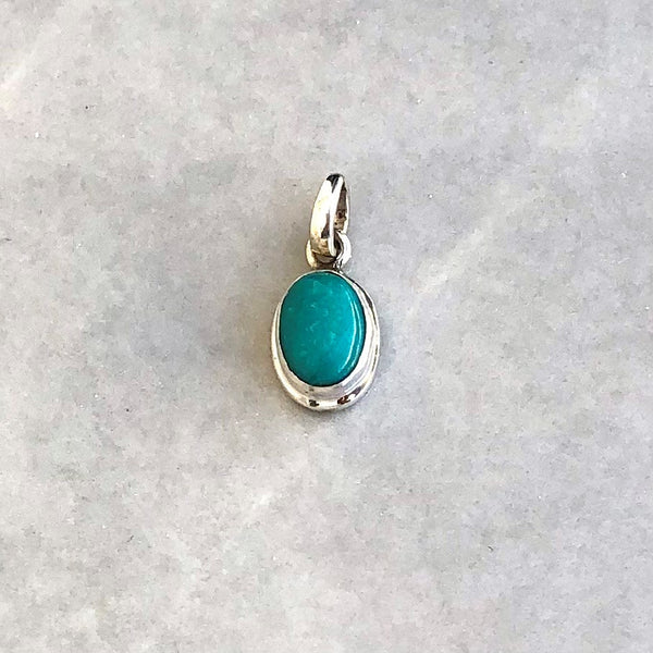 Turquoise mini pendant with smooth silver edge