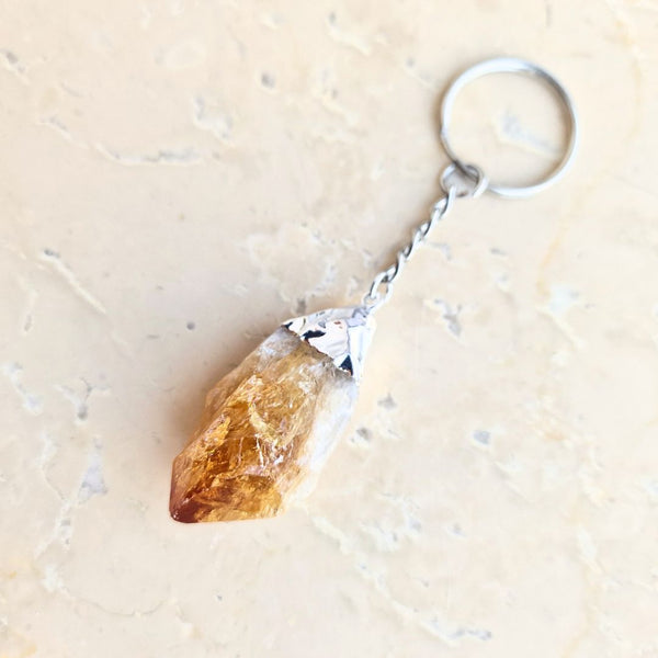 Citrine tip silver colored key ring