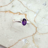 Amethyst, faceted oval in silver ring