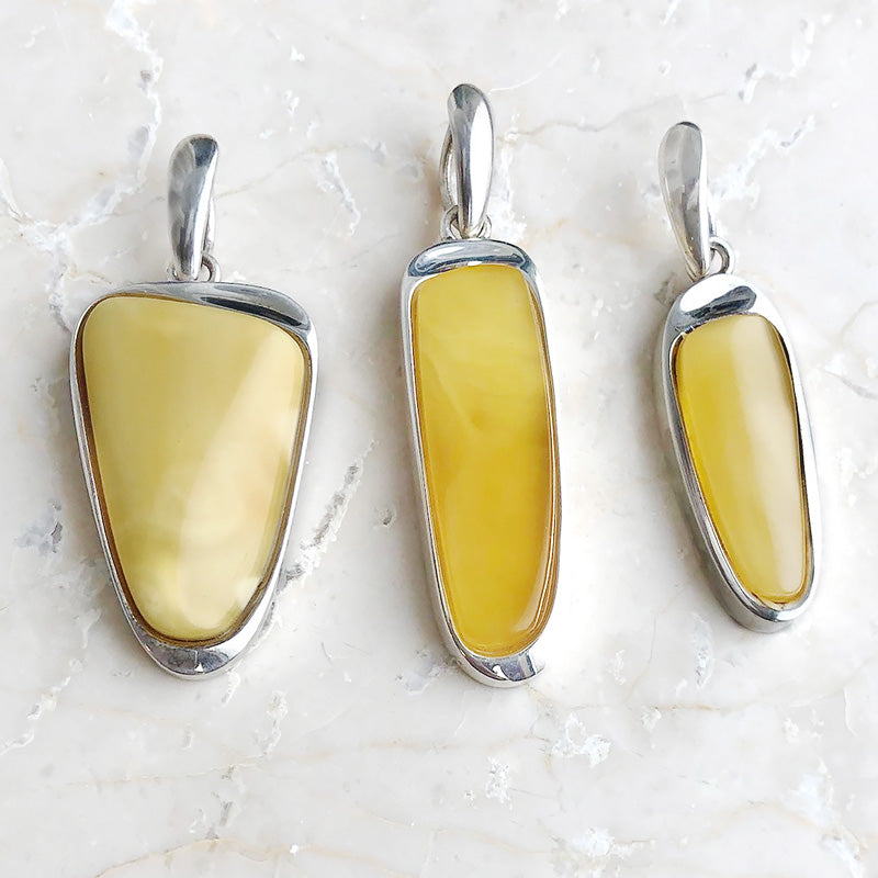 Amber yellow, pendant set in sterling silver