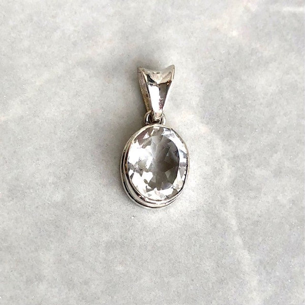 Rock crystal, silver pendant with filigree loop
