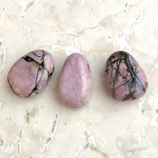 Rhodonite, tumbled pendant with holes