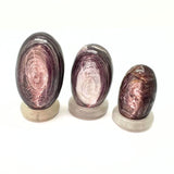 Shiva lingam, useita kokoja