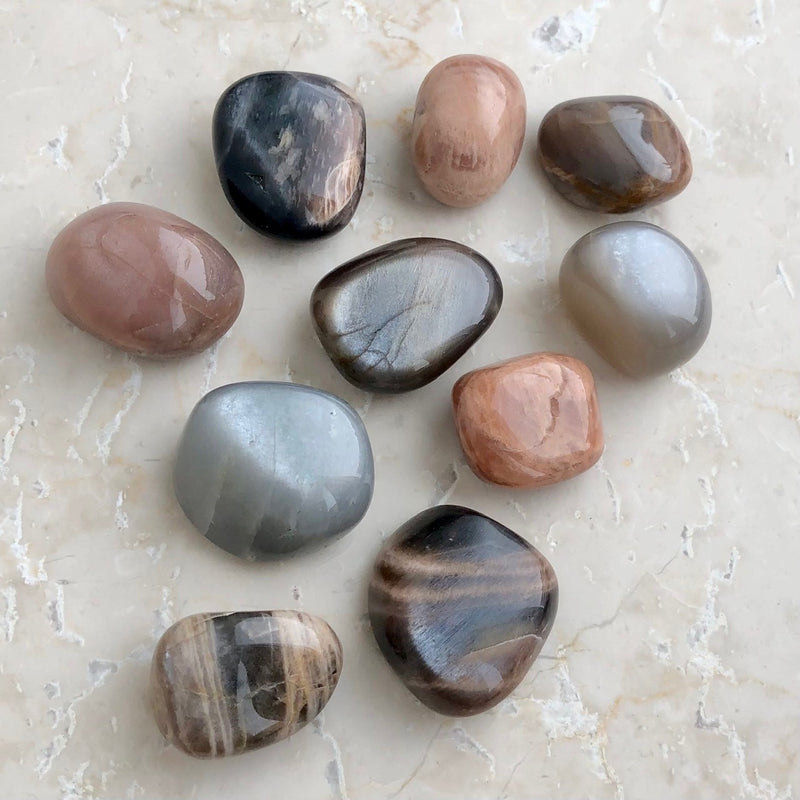Mix of black and peach moonstone gross
