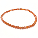 Månsten, persika halsband 8 mm pärlor