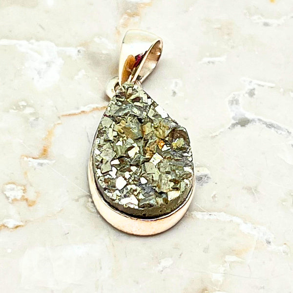 Pyrite cluster in silver pendant