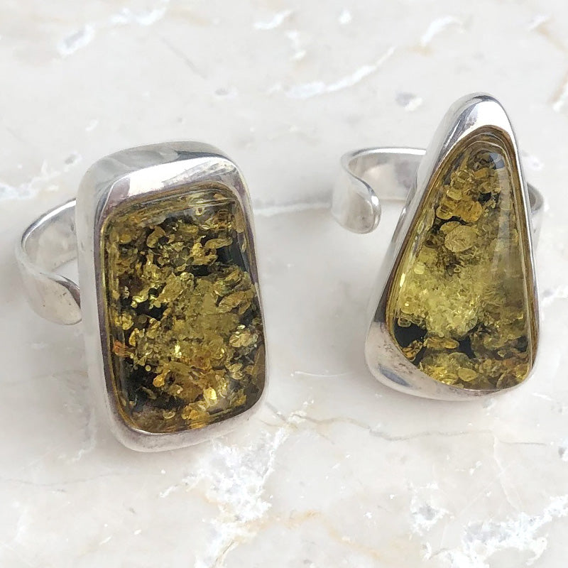 Amber, green with silver adjustable. Two variants