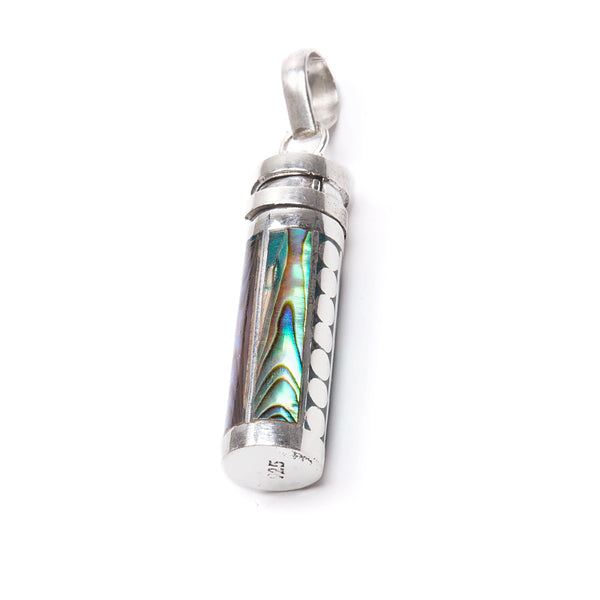 Paua shell inlays on prayer cylinder in silver