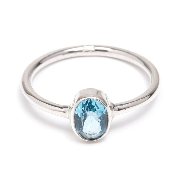 Blue topaz, oval faceted silver ring