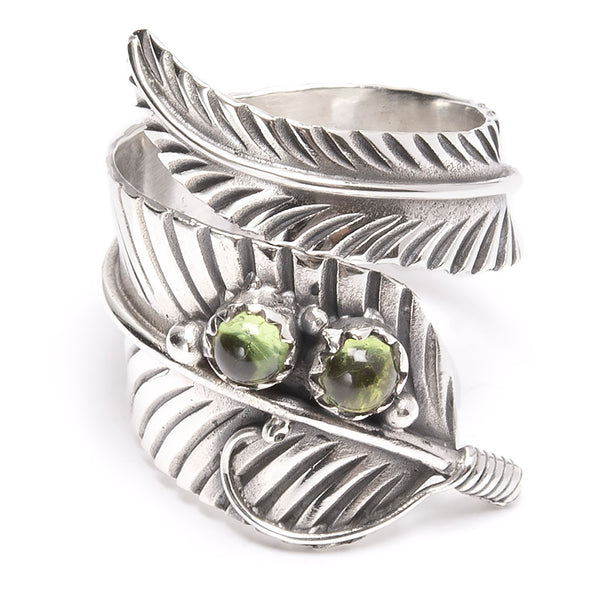 Peridot, large feather silver ring