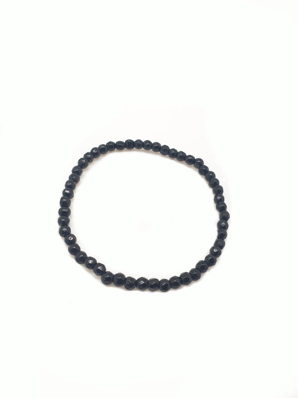 Onyx, armband med runda fasetterade pärlor