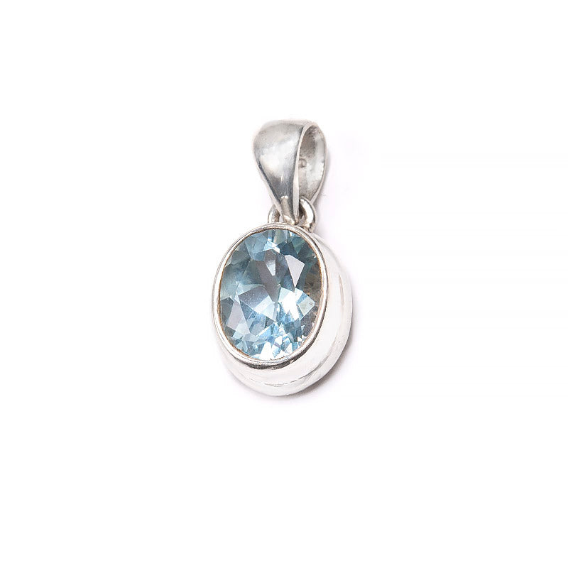 Blue topaz oval pendant slightly smaller stone smooth setting