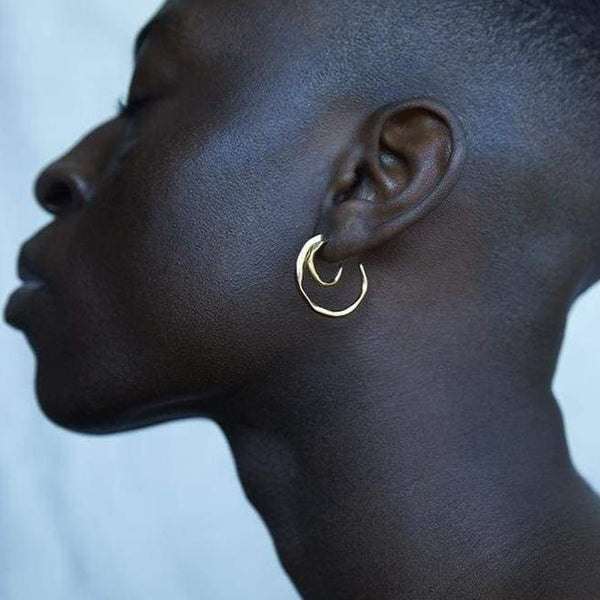 Cornelia Webb, gold hoop earrings large