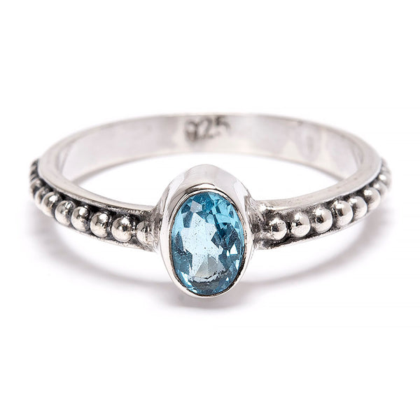 Blue topaz, small faceted stone in silver
